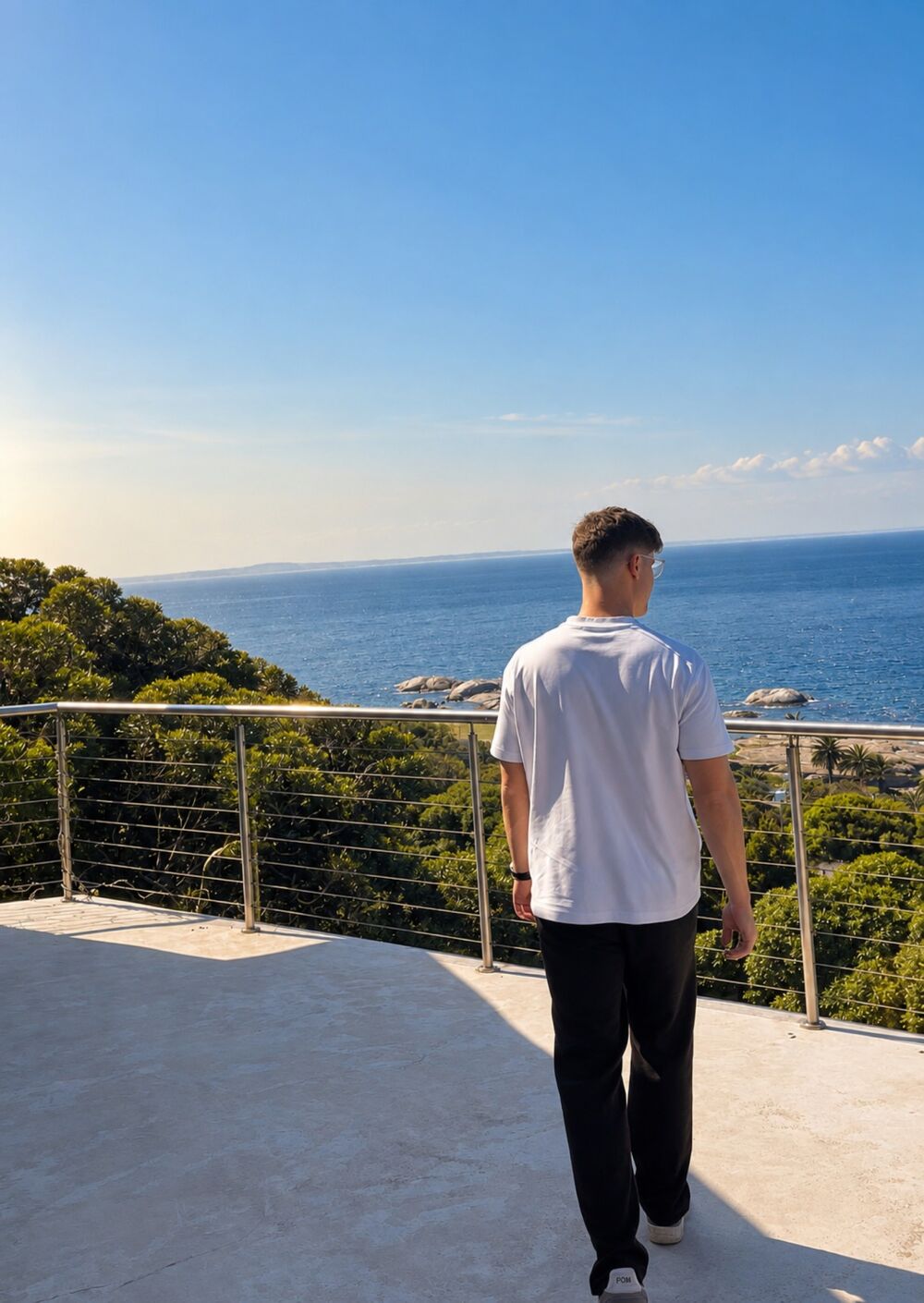 Guest on a terrace overlooking the Atlantic